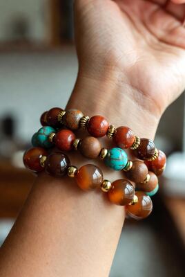 Stacked beaded bracelets with turquoise and jasper